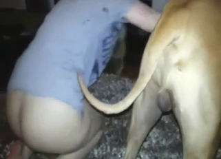 Blonde babe with a round ass fucking a dog