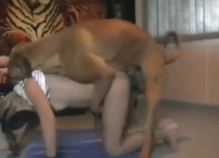 Her hole gets fucked by a brown dog, deeper